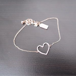 Kate spade bracelet with heart design.